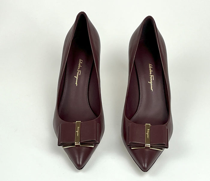 Excellent Pre-Loved Burgundy Smooth Leather Double Bow Point Toe Heels with Light Gold Tone Hardware. (front)