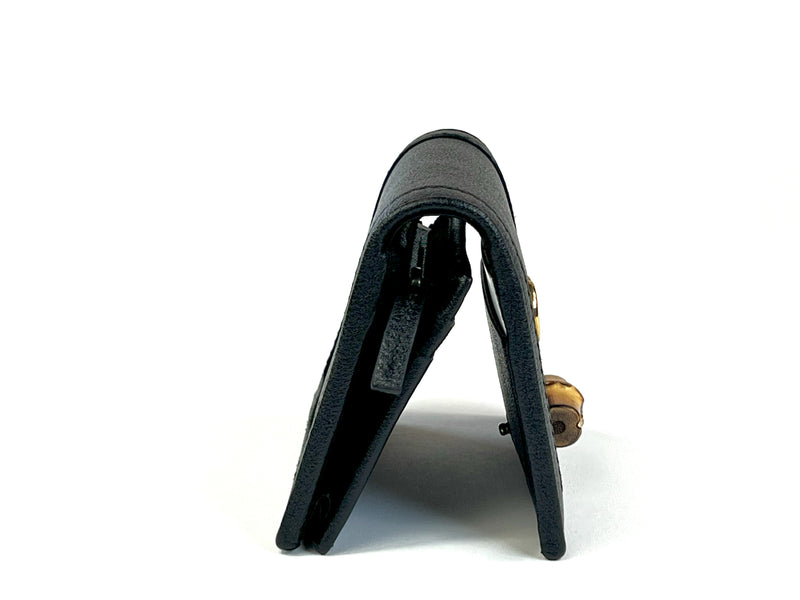 Excellent Pre-Loved Black Grained Leather Bifold Card Holder with Bamboo Clasp Embellishment.(side)