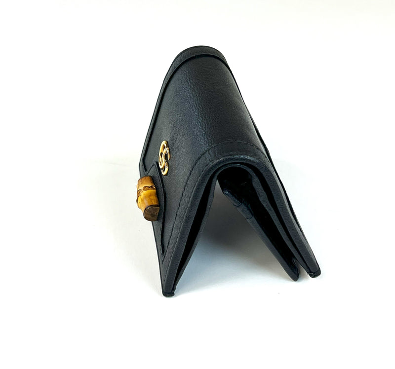 Excellent Pre-Loved Black Grained Leather Bifold Card Holder with Bamboo Clasp Embellishment.(side)