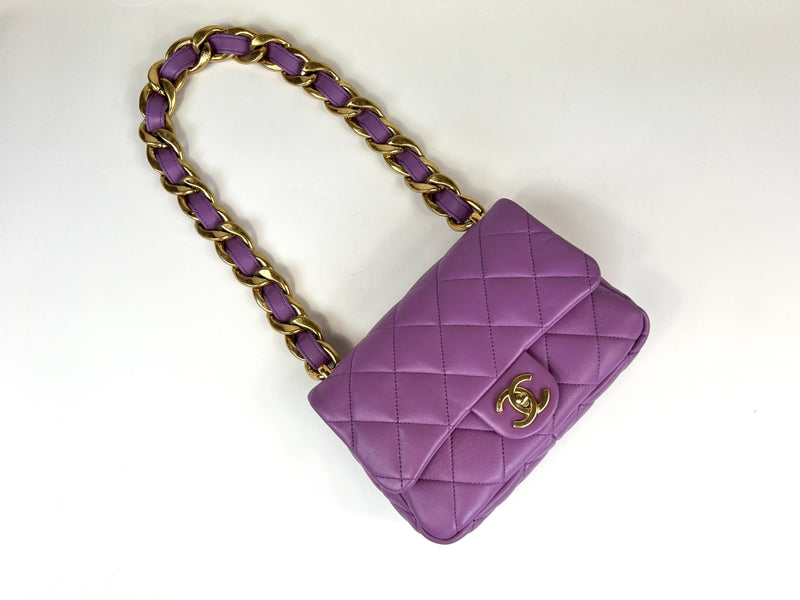 Excellent Pre-Loved Purple Lambskin Leather Flap Bag with Tonal Leather Interlaced Chunky Chain.(flat lay)