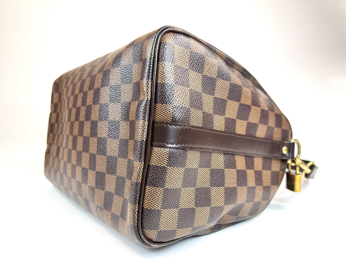 Excellent Pre-Loved Dark Brown Checker Patterned Coated Canvas Top Handle Bowling Bag with Top Zip and Dark Brown Leather Accents.(corner)
