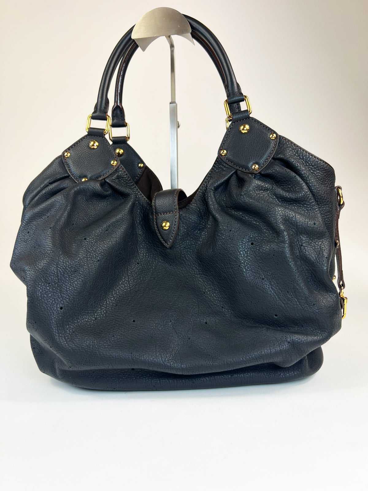 Excellent Pre-Loved Black Grained Leather with Perforated Monogram Pattern Large Tote Bag.(back)