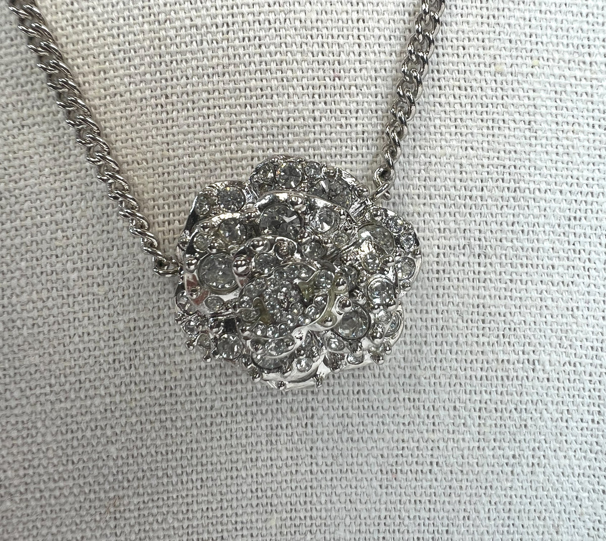 Excellent Pre-Loved Silver Tone Crystal Embellished 3-Tier Camellia Pendant Necklace. (close up)