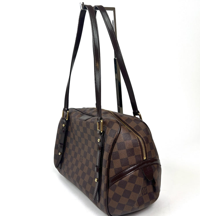 Pre-Loved Brown Checker Pattern Coated Cotton Canvas Shoulder Bag.(side)