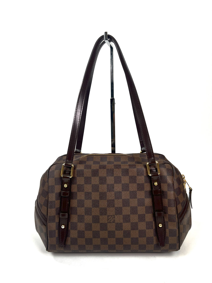 Pre-Loved Brown Checker Pattern Coated Cotton Canvas Shoulder Bag.(front)