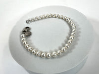 Pre-Loved Mini Pearl Bracelet with Silver Hardware. (front)
