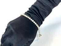 Pre-Loved Mini Pearl Bracelet with Silver Hardware. (on wrist)