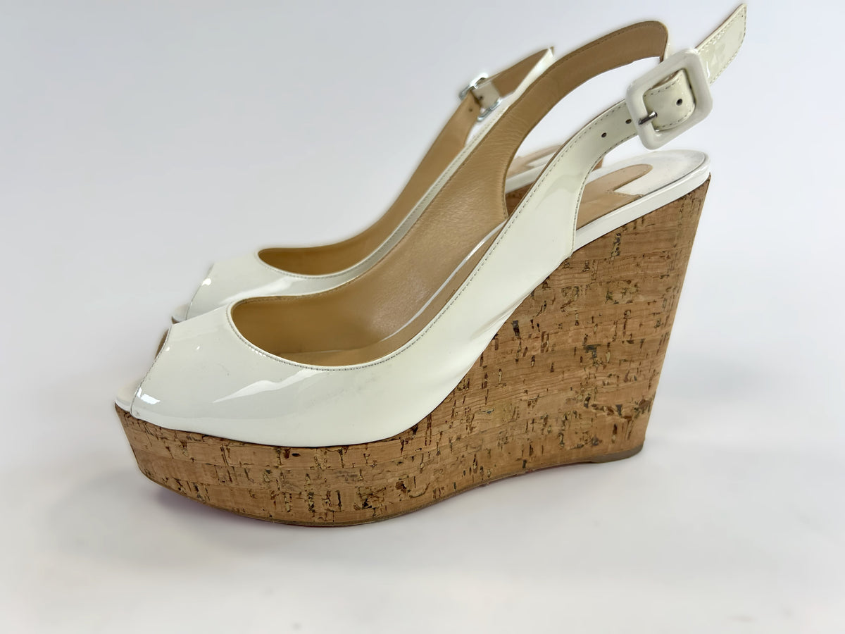 Pre-Loved White Patent Leather Peep Toe Open Back Cork Wedge Sandals with Ankle Strap. (side)