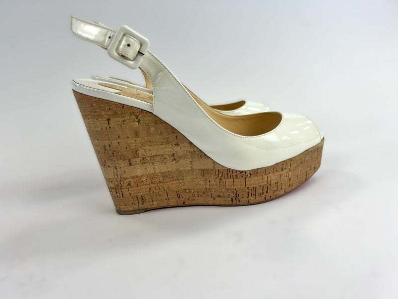 Pre-Loved White Patent Leather Peep Toe Open Back Cork Wedge Sandals with Ankle Strap. (side)