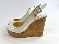 Pre-Loved White Patent Leather Peep Toe Open Back Cork Wedge Sandals with Ankle Strap.(side)