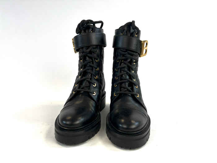 Pre-Loved Black Quilted Leather with Gold Tone Logo/Hardware Lace Up Combat Boots.(front)