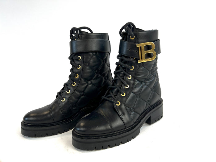 Pre-Loved Black Quilted Leather with Gold Tone Logo/Hardware Lace Up Combat Boots.(front)