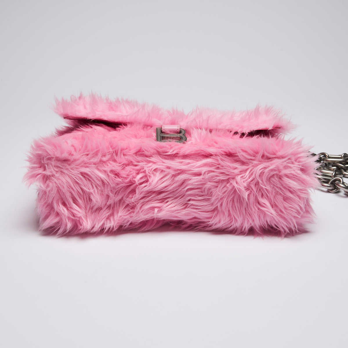 Excellent Pre-Loved Pink Faux Fur Chunky Chain Flap Bag with Aged Silver Tone Hardware. (bottom)