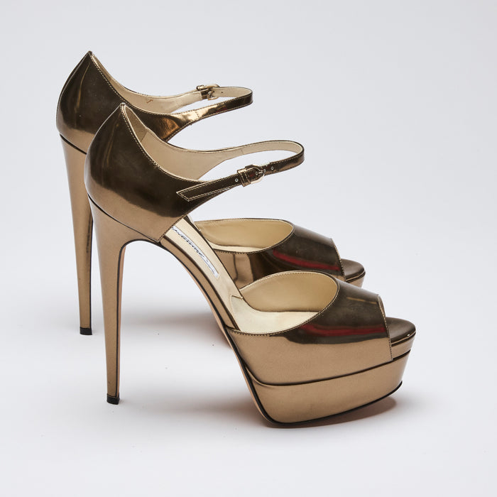 Excellent Pre-Loved Gold Metallic Leather Platform Peep Toe Pumps with Ankle Strap.(side)