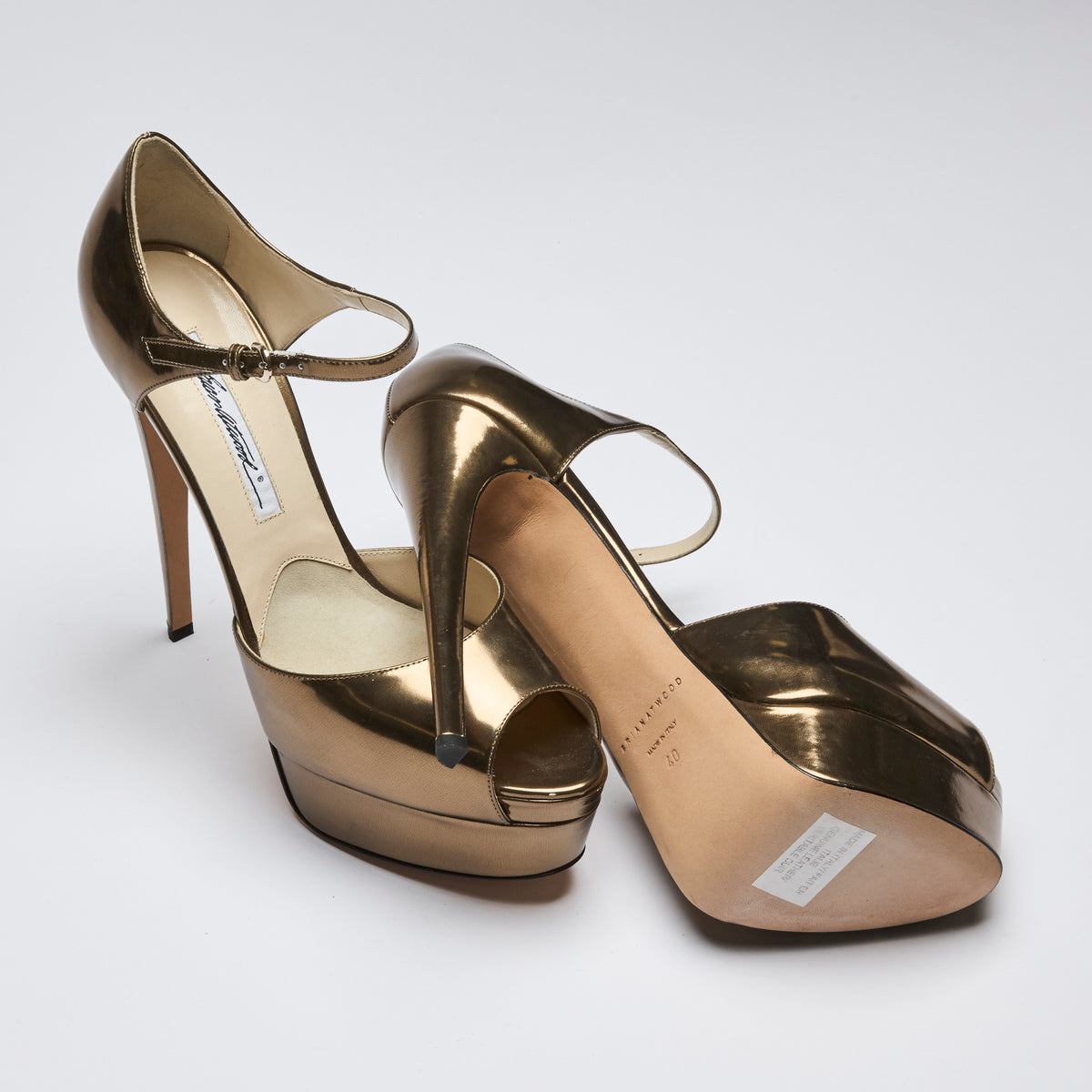 Excellent Pre-Loved Gold Metallic Leather Platform Peep Toe Pumps with Ankle Strap.(bottom)