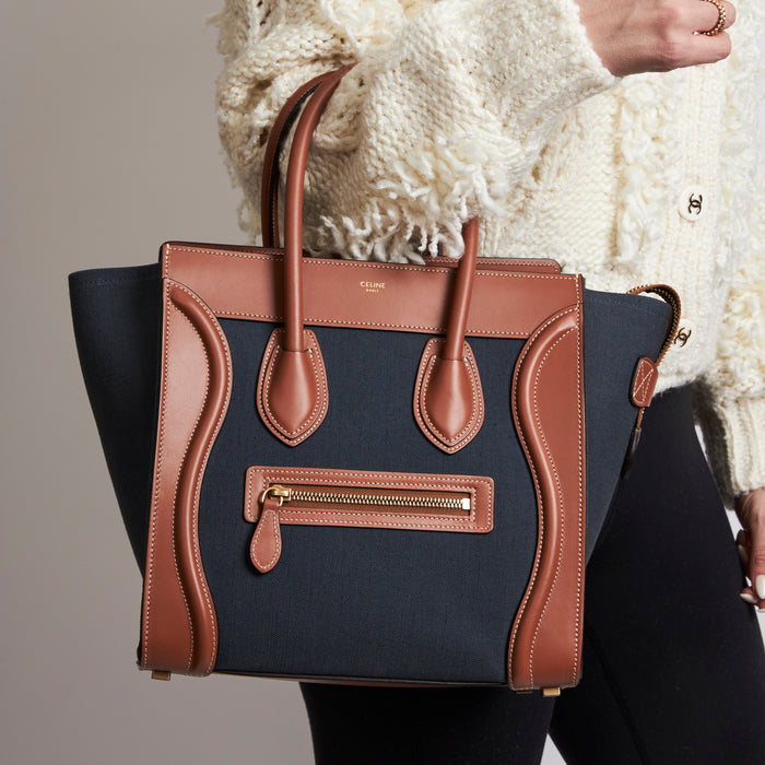 Excellent Pre-Loved Denim Top Handle Tote Bag with Brown Leather Details and Contrast Stitching.  (on body)