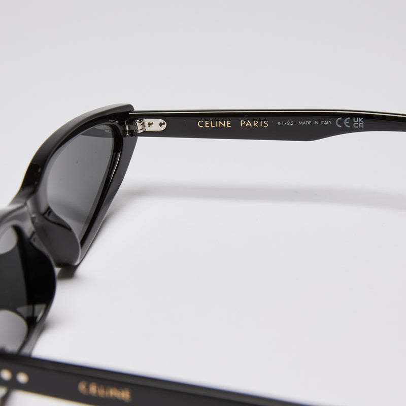 Excellent Pre-Loved Black Acetate Narrow Cat Eye Sunglasses with Gold Logo on Arms.(logo)