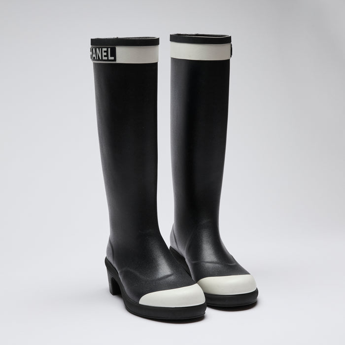 Excellent Pre-Loved Black Rubber Tall Rain Boots with White Toe Cap and Logo Trim at Top. (front)