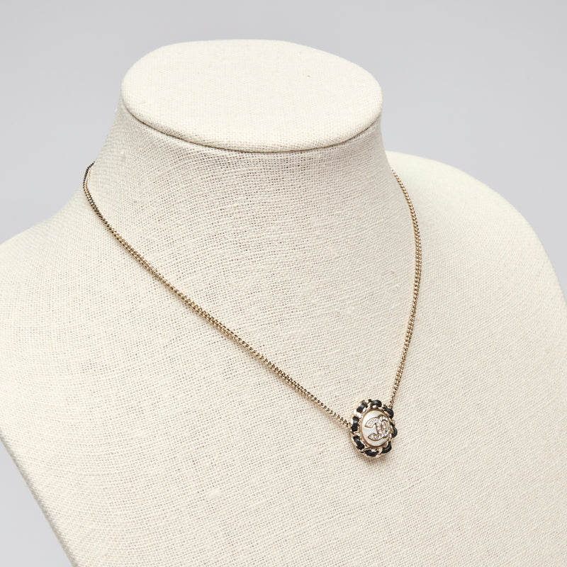 Pre-Loved Chanel™ Gold Tone Interlocking Letter Logo Pendant Necklace.