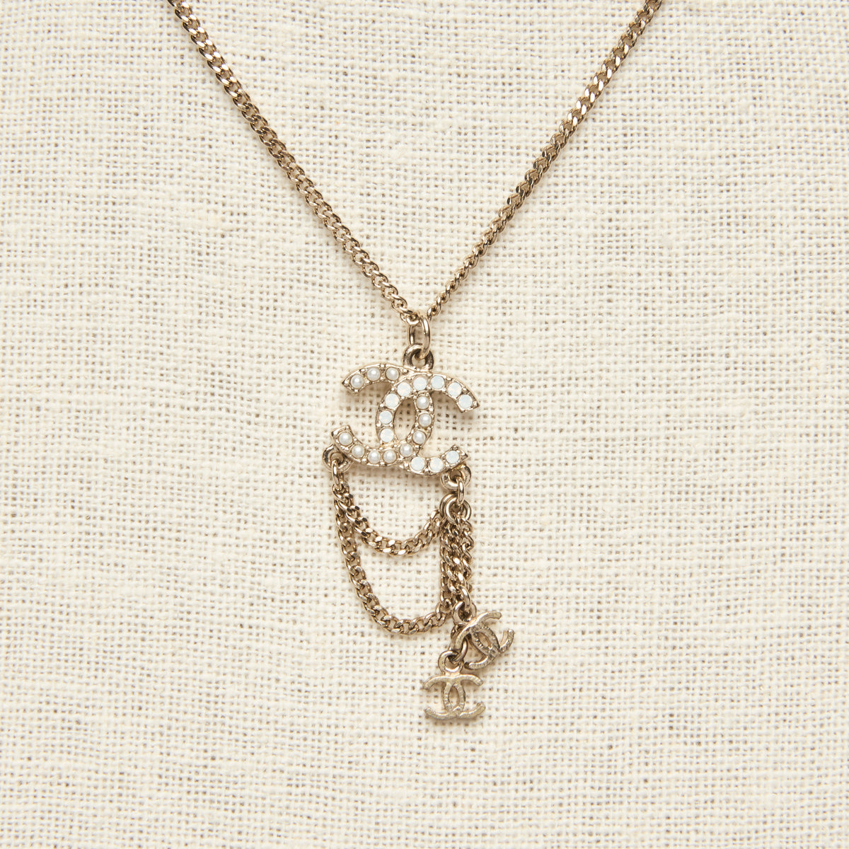 Pre-Loved Chanel™ Interlocking Crystal and Gold Tone Letter Logo Chandelier Necklace