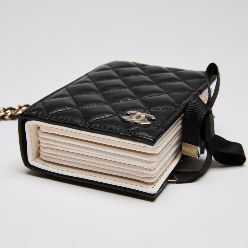 Excellent Pre-Loved Chanel Lambskin Quilted Book Card Holder on Chain (corner)