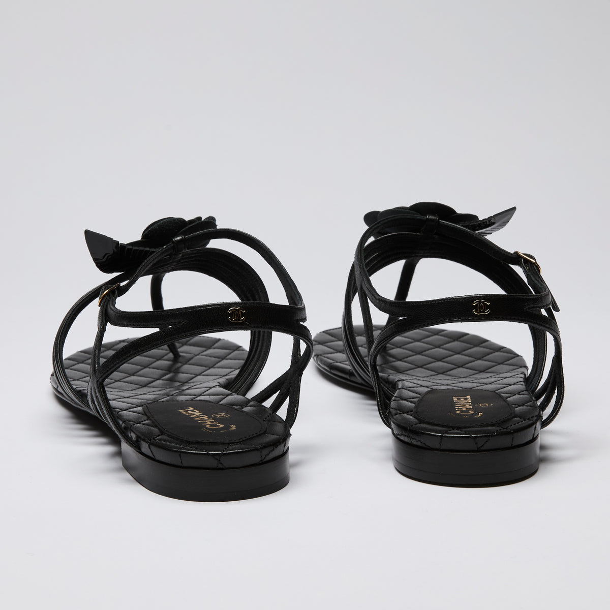 Pre-Loved Chanel ™ Quilted Camellia Flower Black Leather Sandals Size 40