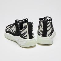 Excellent Pre-Loved Black and White Nylon Quilted Sneakers with Suede Details and Graffiti Logo Print.(back)