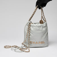 Pre-Loved Chanel ™ Blue Lambskin Mini 22 Bag with Gold Hardware