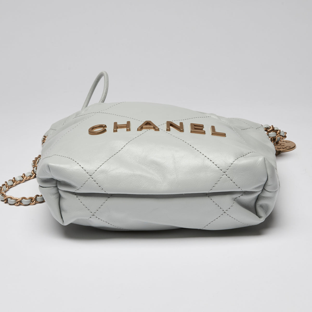 Pre-Loved Chanel ™ Blue Lambskin Mini 22 Bag with Gold Hardware