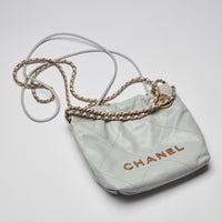 Pre-Loved Chanel ™ Blue Lambskin Mini 22 Bag with Gold Hardware