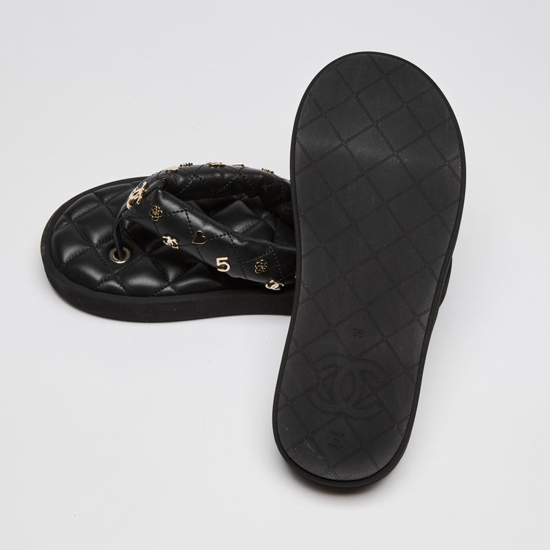 Pre-Loved Chanel™ Black Lambskin Quilted Padded Gold Charm Thong Sandals Size 36