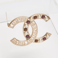 Pre-Loved Chanel ™ Gold CC Brooch with Embellishments and Logo Cutout