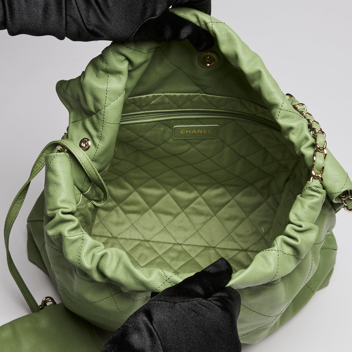 Pre-Loved Chanel ™ Quilted 22 Bag in Green