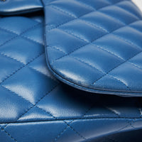Pre-Loved Bright Blue Lambskin Large Double Flap Bag with Silver Hardware. (close up)