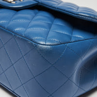 Pre-Loved Bright Blue Lambskin Large Double Flap Bag with Silver Hardware.(close up)