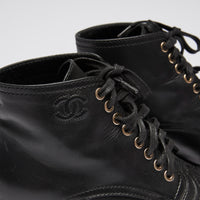 Excellent Pre-Loved Black Leather Square Toe Lace Up Combat Boots with Black Patent Leather Toe Cap. (close up)