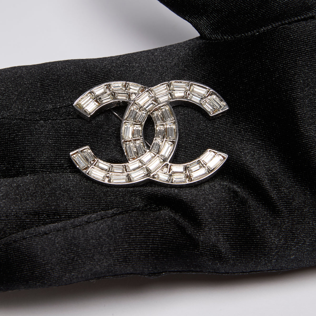 Pre-Loved Chanel™ Interlocking Letter Logo Baguette Crystal Brooch