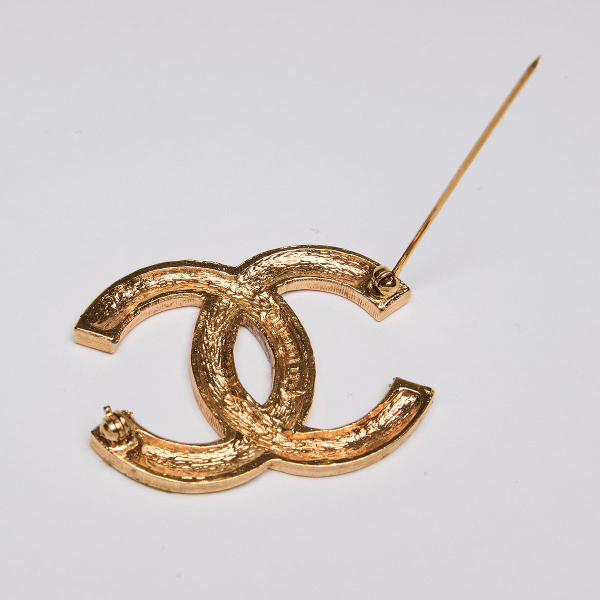 Pre-Loved Chanel™ Crystal Embellished Interlocking Letter Logo Brooch
