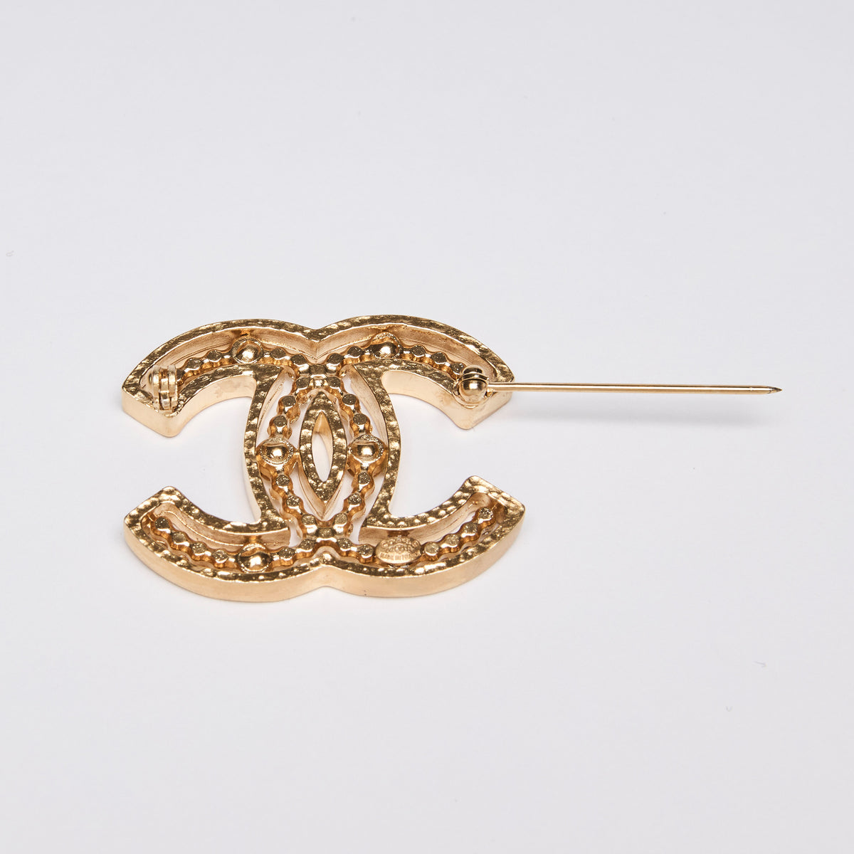 Pre-Loved Chanel™ Cut-Out Interlocking Letter Logo Crystal Crusted Brooch
