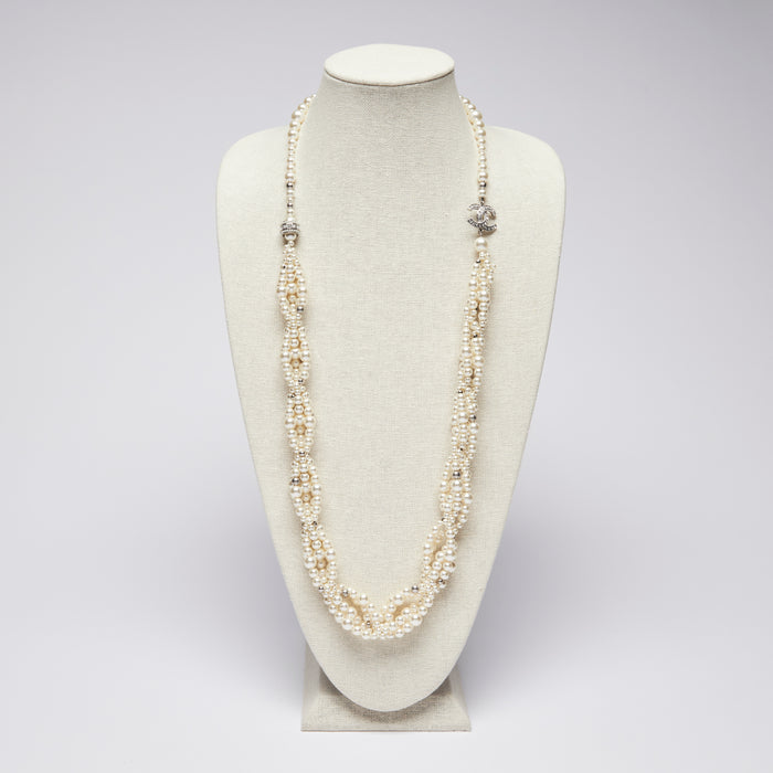 Excellent Pre-Loved Pearl Twist Long Necklace with Silver Tone Crystal Embellished Logo.(front)