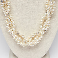 Excellent Pre-Loved Pearl Twist Long Necklace with Silver Tone Crystal Embellished Logo.(close up)