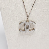 Excellent Pre-Loved Large Crystal Embellished Logo Pendant Necklace with Silver Tone Chain. (back)