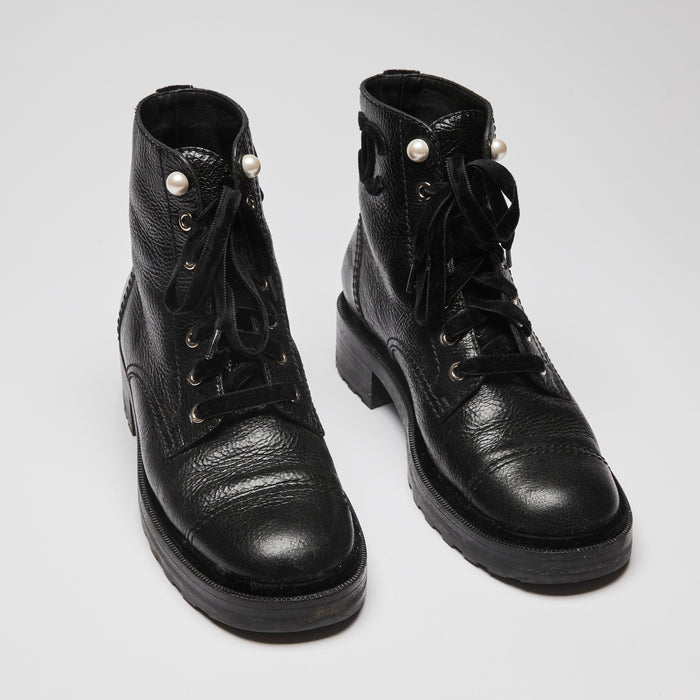 Pre-Loved Black Leather Ankle Combat Boots with Pearl Details, Tonal Velvet Logo and Laces (front)