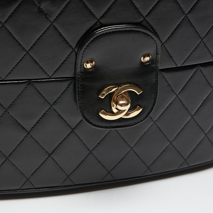 Pre-Loved Black Quilted Leather Oval Top Handle Vanity Case. (turn lock)