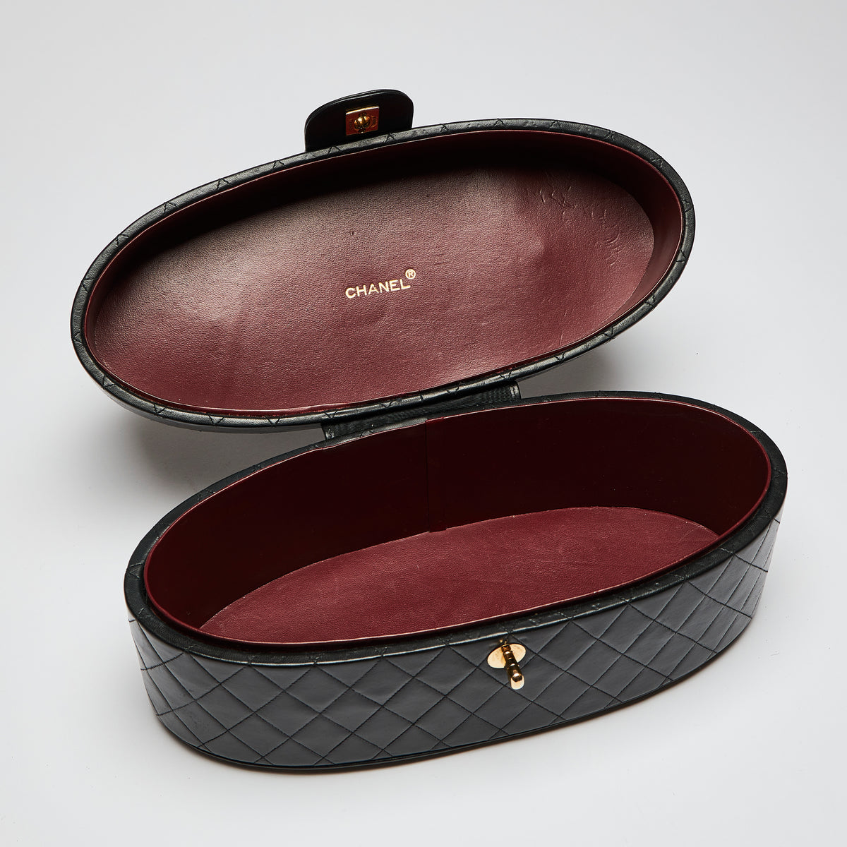 Pre-Loved Black Quilted Leather Oval Top Handle Vanity Case.(interior)