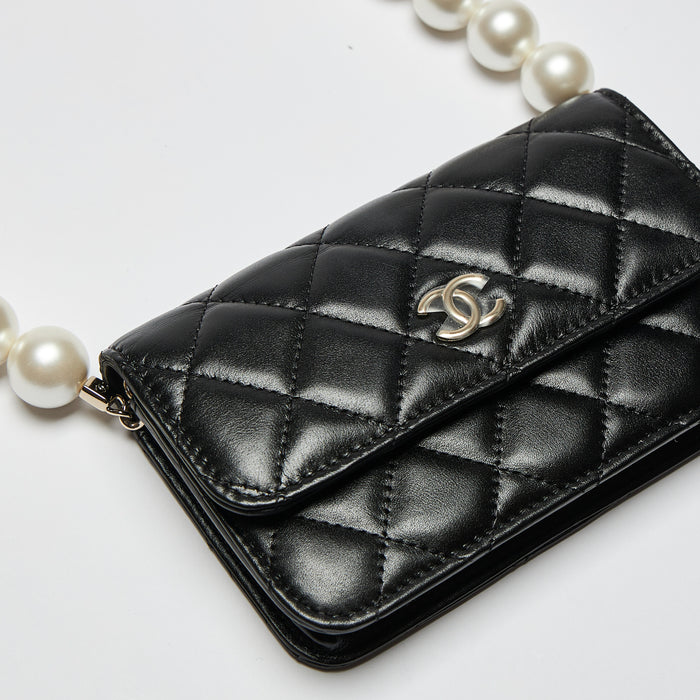 Excellent Pre-Loved Black Lambskin Quilted Leather Mini Bag with Oversized Faux Pearl Shoulder Strap.(close up)