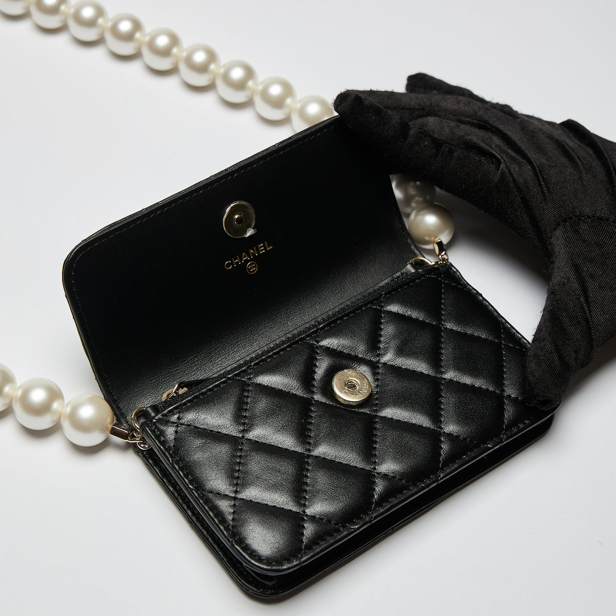 Excellent Pre-Loved Black Lambskin Quilted Leather Mini Bag with Oversized Faux Pearl Shoulder Strap.(flap)