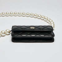 Excellent Pre-Loved Black Lambskin Quilted Leather Mini Bag with Oversized Faux Pearl Shoulder Strap. (bottom)