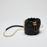 Excellent Pre-Loved Black Quilted Leather Mini Drawstring Bag with Pearl Shoulder Strap.(Front)