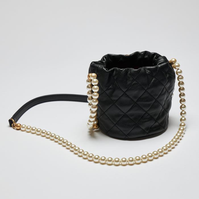 Excellent Pre-Loved Black Quilted Leather Mini Drawstring Bag with Pearl Shoulder Strap.(back)